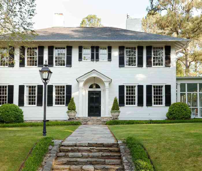 Colonial style home exterior with stone accents